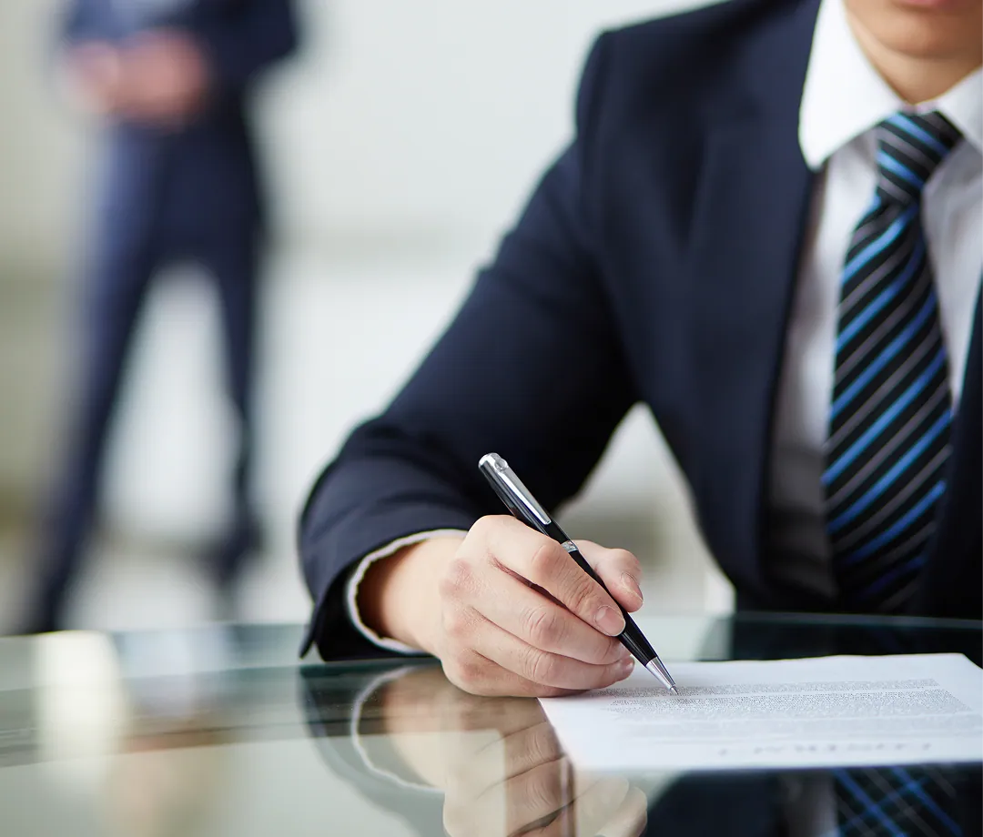 Professional signing a document
