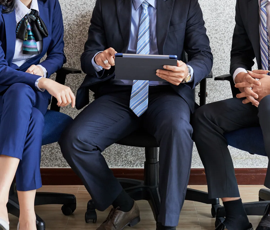 Business team reviewing a tablet